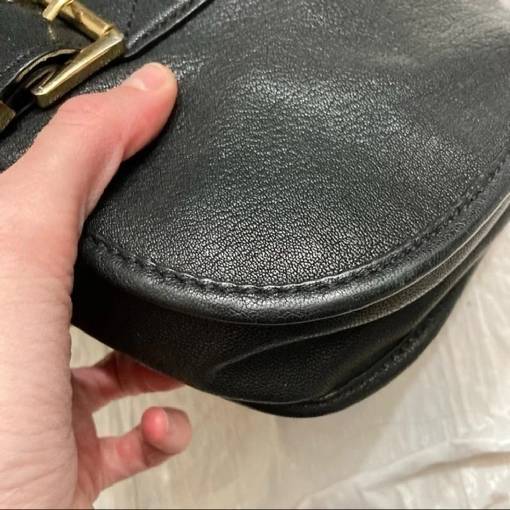Michael kors black leather buckled saddle flap bag
